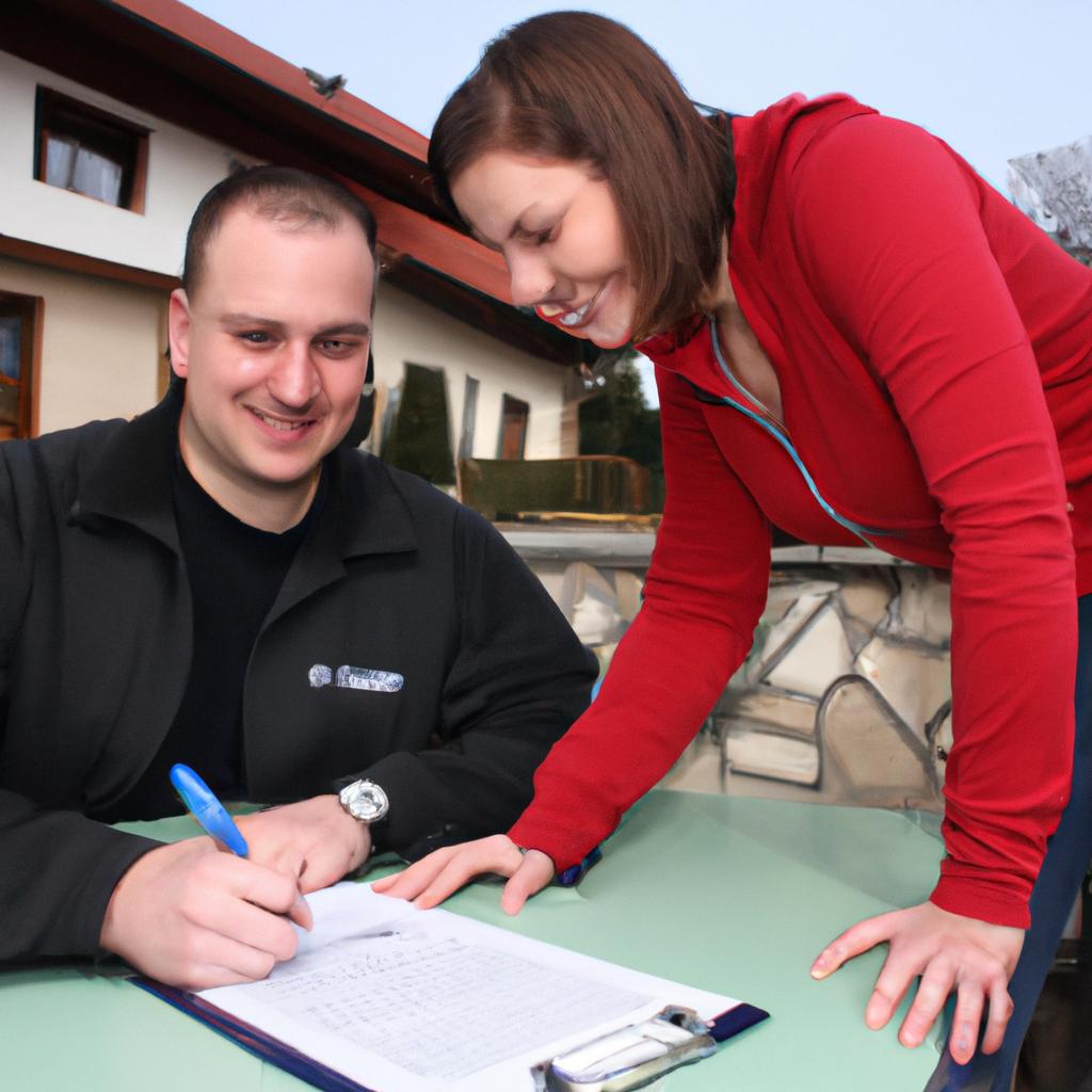 Person signing loan agreement, smiling
